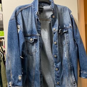Distressed long denim jacket